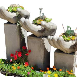 Hand planter set on pedestal